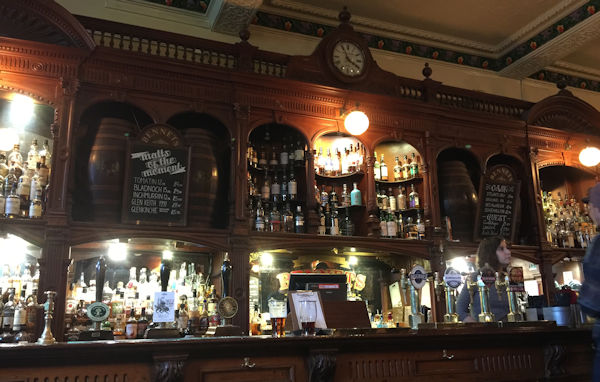 A Victorian period carved wooden bar back