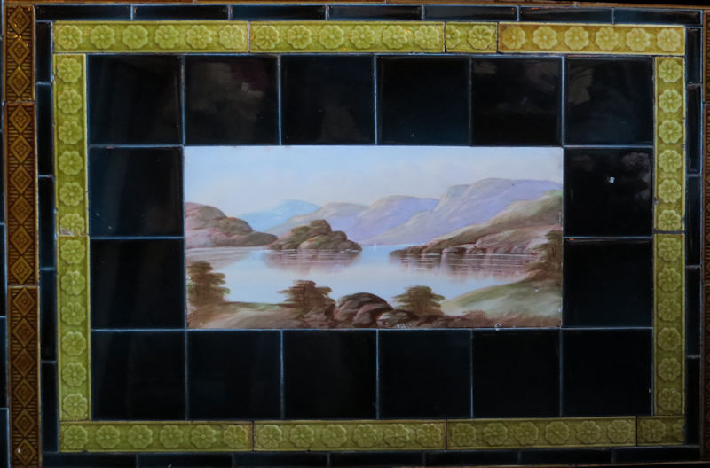 A Victorian tile showing a rural Scottish scene.